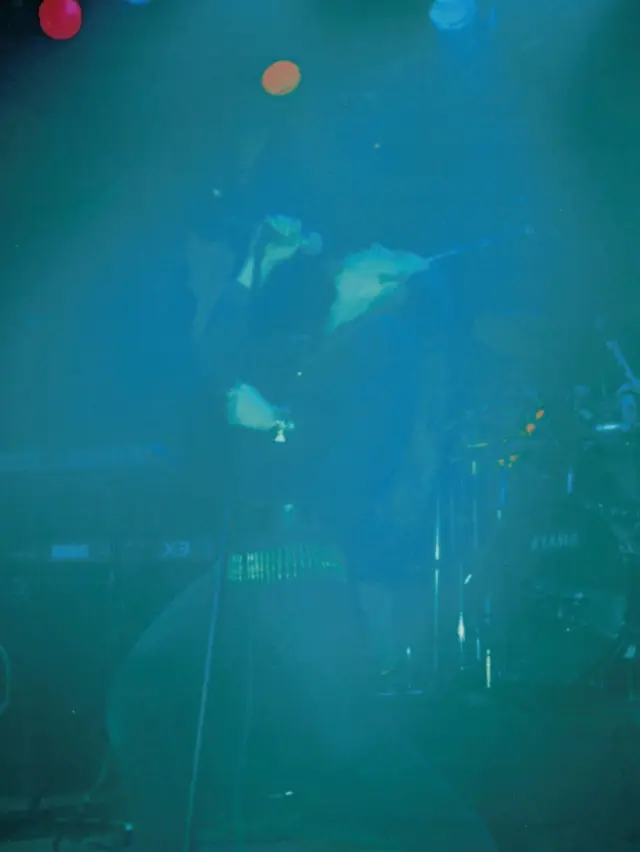 ”Hellion!”, screamed Alexi Laiho at the top of his lungs on the stage of club Tavastia in Helsinki, December 5th, 1997. ⭐️

During their early years, Children of Bodom used to end their shows with the W.A.S.P. song Hellion. Did you know they recorded two separate versions of the song with producer Anssi Kippo at Astia-studio? Which version you like more and why? Write your answer in the comments. 🤘

These four photos from that show were taken by Jyri Vahvanen, who at the time was the guitarist for the Finnish black metal band Horna. Jyri and Horna’s drummer at the time, Jarkko Heilimo, traveled from Lappeenranta to club Tavastia with Anssi Kippo, who was mixing the show. Both Jyri and Jarkko were dressed in a suite and tie as a joke — who would, especially back then, go to a metal show dressed like that? Jyri recalls how the COB guys surprisingly couldn’t understand their choice of outfit. 😅

COB played two shows at Tavastia in December 1997. Several cool photos have emerged from the night they performed with H.I.M. and Xysma. 🔥

@cobhc @alexilaiho.official @jarkkoh 

Photo by Jyri Vahvanen aka @lohmare 

#childrenofbodom #alexilaiho #noguitar #hellion #tavastia