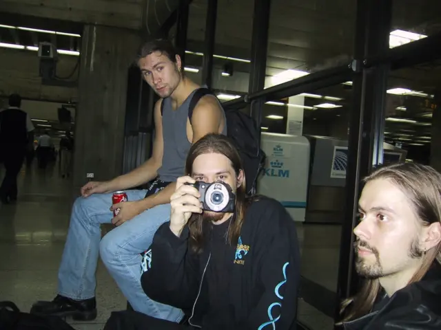 A throwback from November 11, 2001! ⭐️ Jaska Raatikainen, Janne Wirman and COB’s live sound engineer Anssi Kippo on their way to play a show at Teatro Providencia in Santiago, Chile. 🤘
 
The tour was called Machete Up Your A$$, which was a part of the Follow the Reaper world tour. Children of Bodom played shows in Mexico, Colombia, Chile and Brazil. If you saw them on stage on that tour, what is your coolest memory?
 
To learn about many funny incidents on that South American Tour in 2001, watch the warm-hearted interview video series of Alexander, Janne, Henkka and Jaska called The Early Years of Children of Bodom – 30 Years of Astia-studio on the Astia-studio YouTube channel. Link in Astia-studio’s bio. 👍

@cobhc @raatikainen_jaska @janne_wirman 

#childrenofbodom #cobhc #jaskaraatikainen #jannewirman #anssikippo